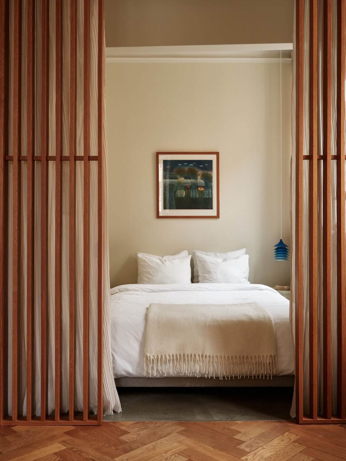 43 Ideas To Divide a Studio Apartment Into Multiple Rooms 78 studio-apartment-room-divider-ideas-wood-slats-curtain-nordroom