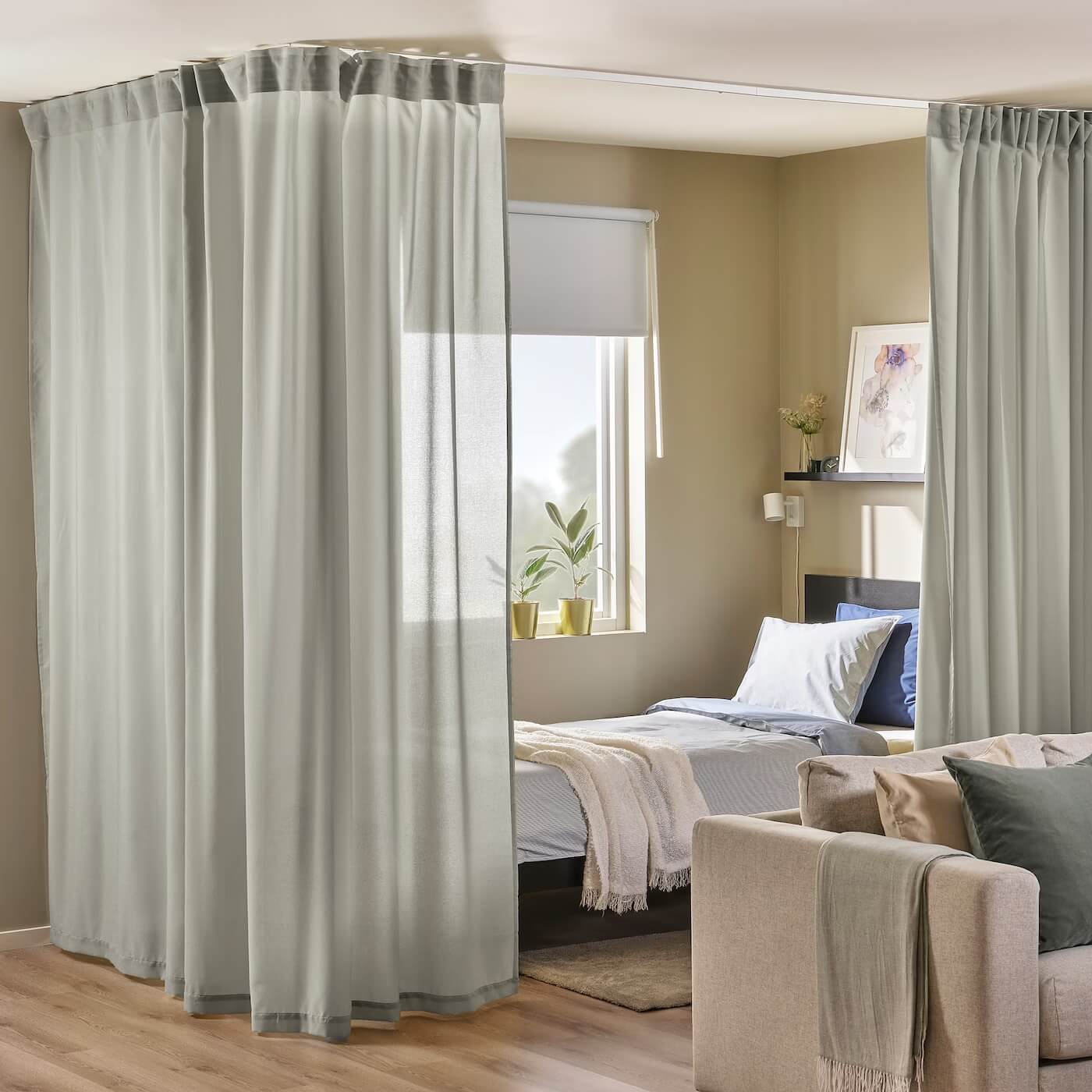 43 Ideas To Divide a Studio Apartment Into Multiple Rooms 3 studio-apartment-sheer-curtains-around-the-bed-ikea-nordroom
