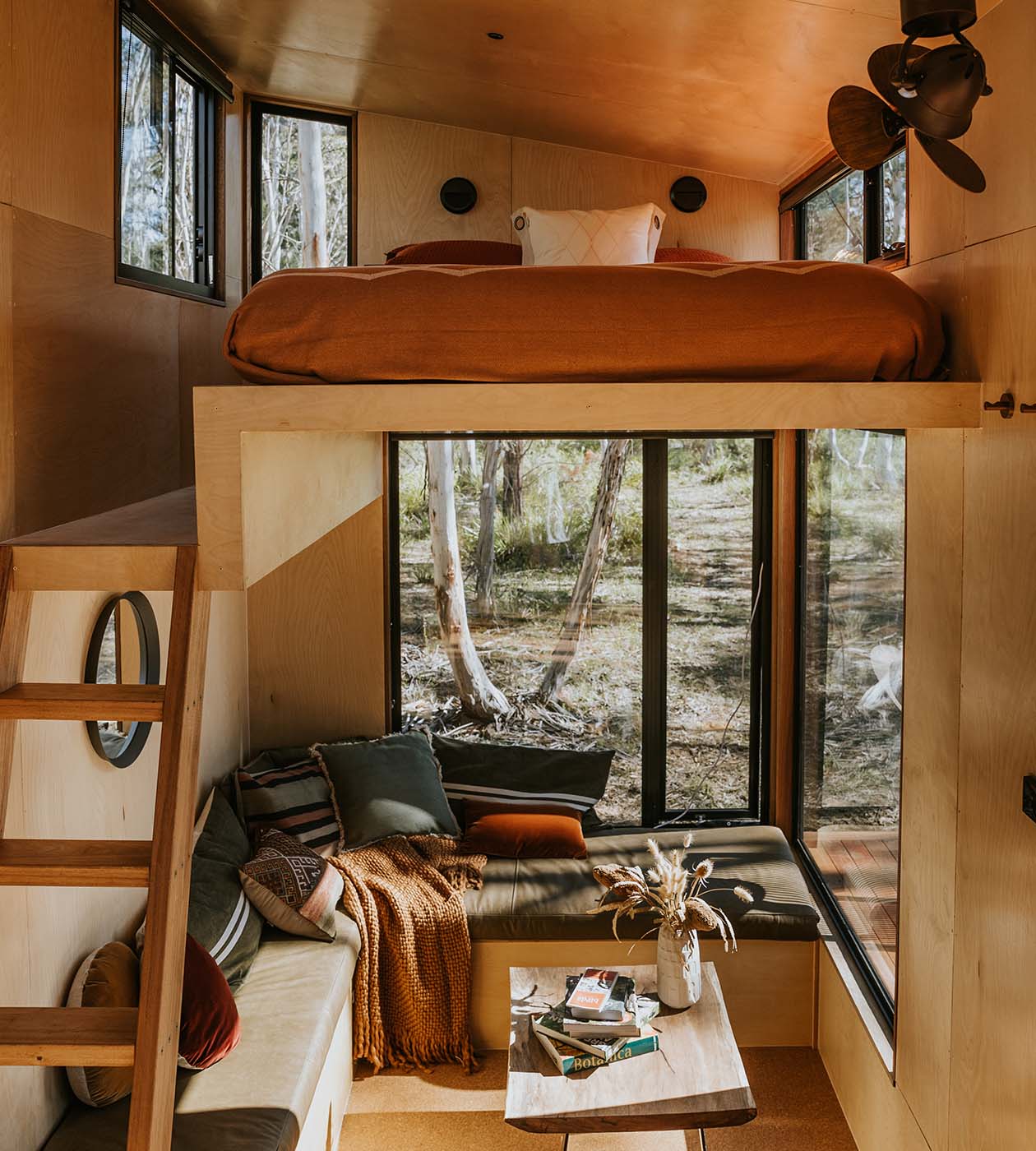 43 Ideas To Divide a Studio Apartment Into Multiple Rooms 37 tiny-house-loft-bed-living-room-nordroom