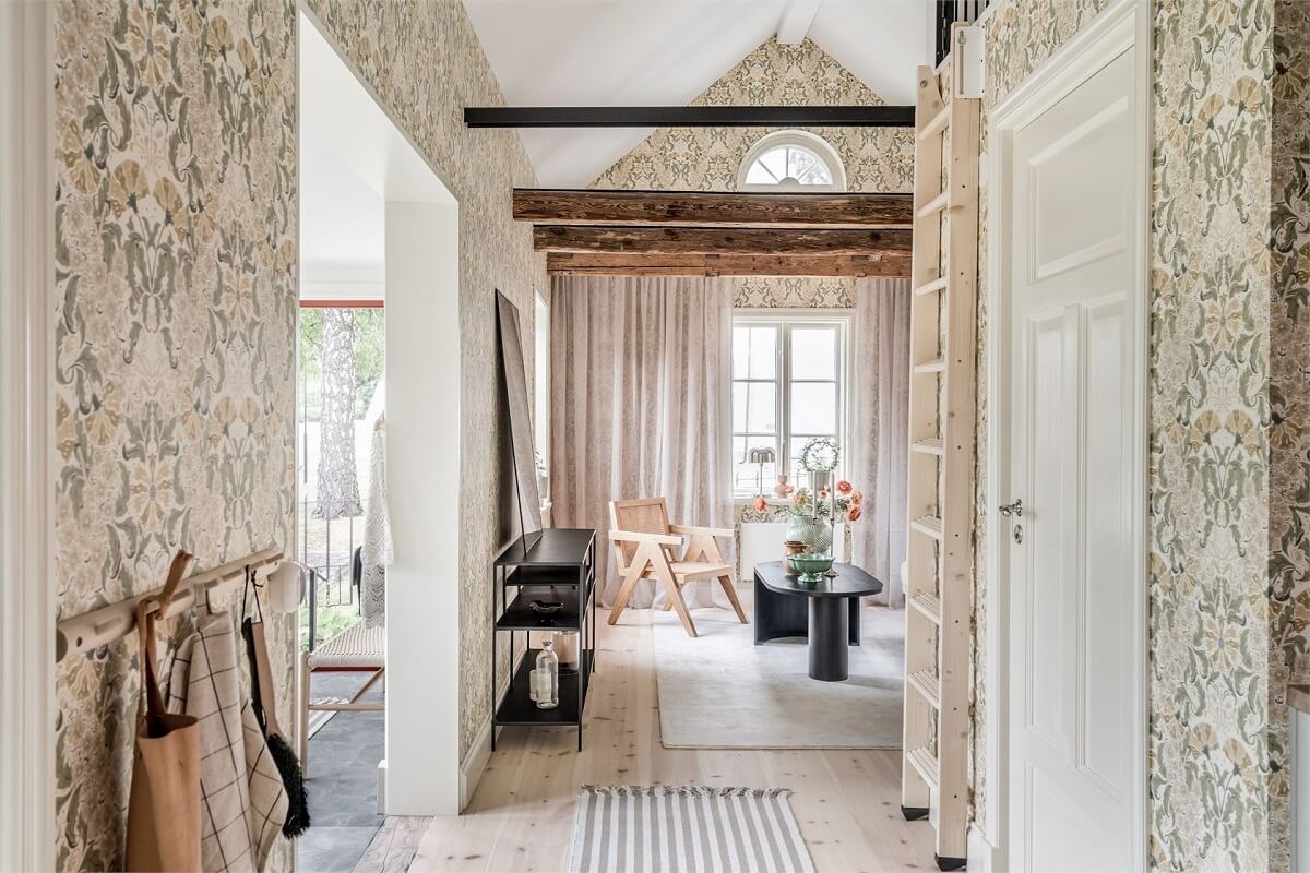 An Idyllic Small Swedish House with Wooden Beams 6 tiny-house-sweden-pitched-ceiling-wallpaper-wooden-beams-nordroom