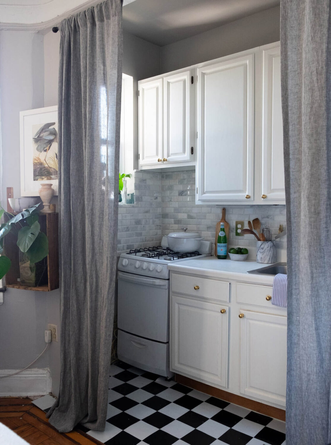 53 Studio Apartments with a Curtain Room Divider 38 tiny-studio-gray-curtain-hides-kitchen-nordroom