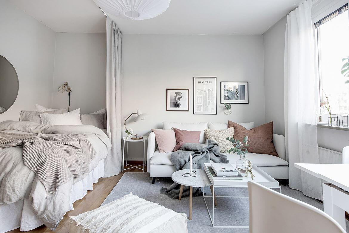 53 Studio Apartments with a Curtain Room Divider 58 white-gray-scandi-studio-apartment-layered-textiles-curtain-room-divider-nordroom