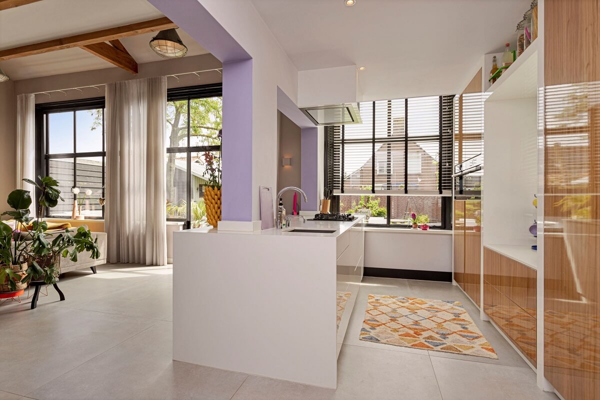 A Colorful School Conversion in The Netherlands 6 white-kitchen-island-school-conversion-nordroom
