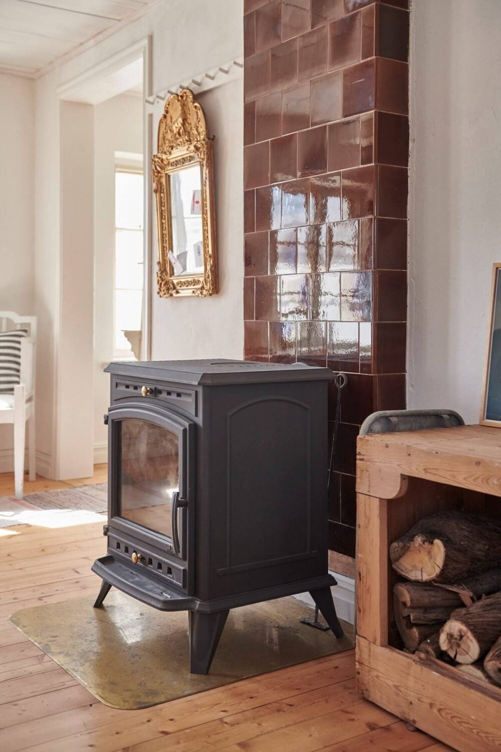 Natural Light in a Charming Swedish Country House 6 wood-burning-stove-country-house-sweden-nordroom