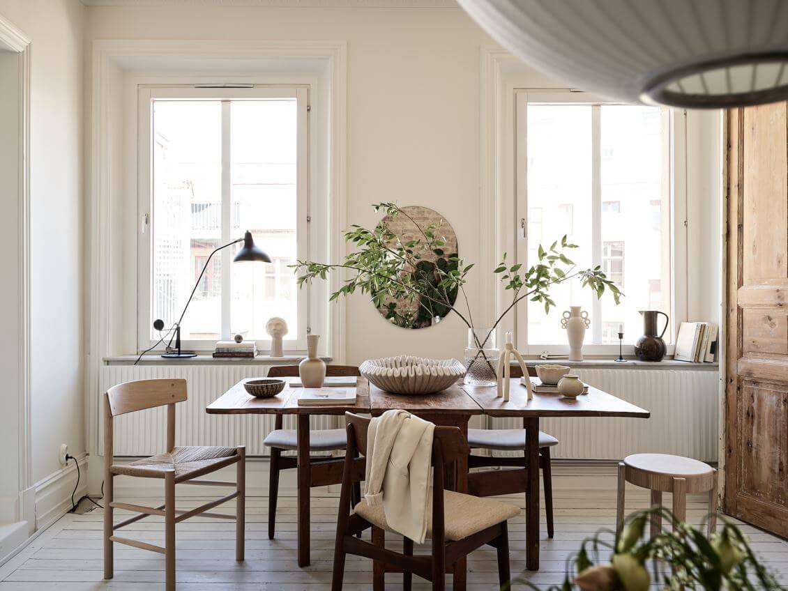 A Swedish Apartment with an Exposed Brick Wall 5 wooden-dining-space-nordic-home-nordroom