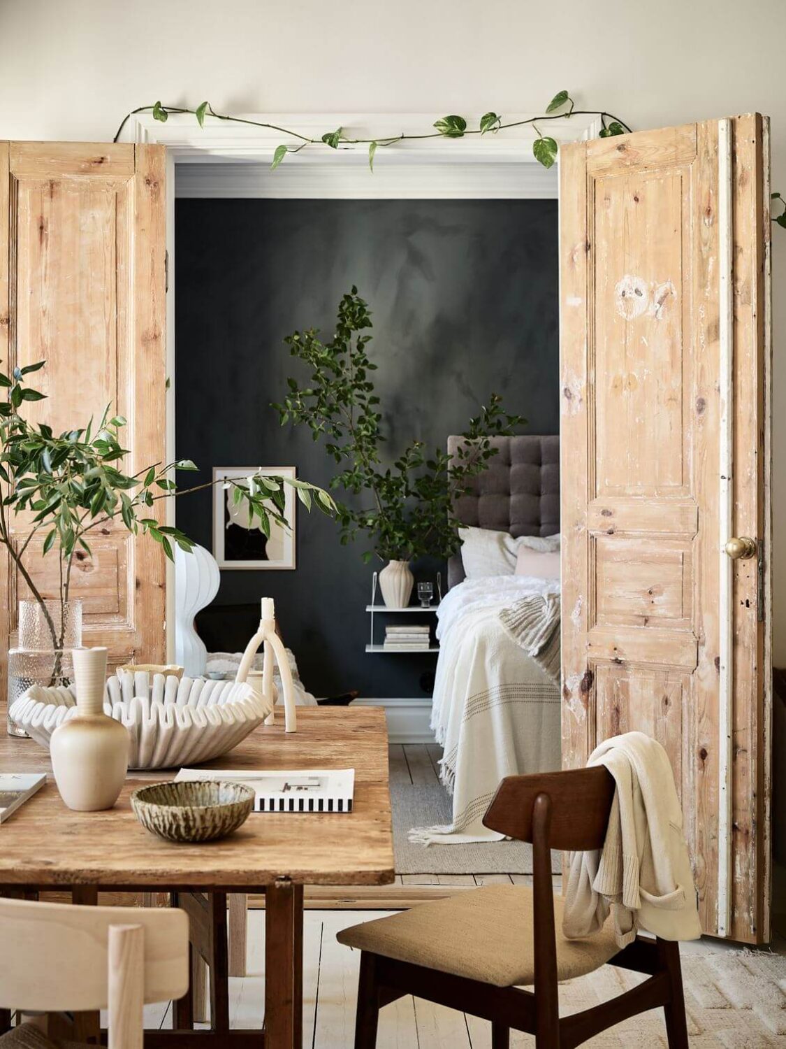 A Swedish Apartment with an Exposed Brick Wall 10 wooden-double-doors-bedroom-nordic-home-nordroom