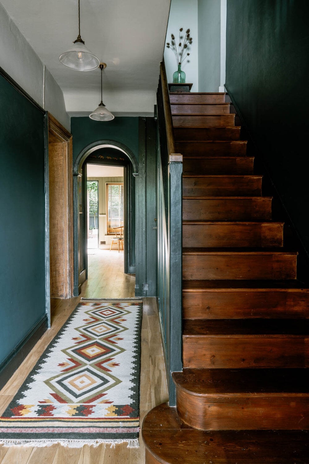 A Warm Living Room in a Historic English Home 7 wooden-staircase-blue-walls-nordroom