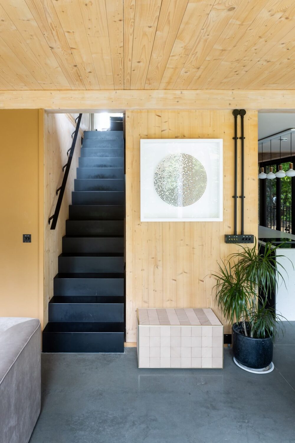 A Modern English Home with a Sculptural Facade 14 wooden-walls-staircase-modern-home-england-nordroom