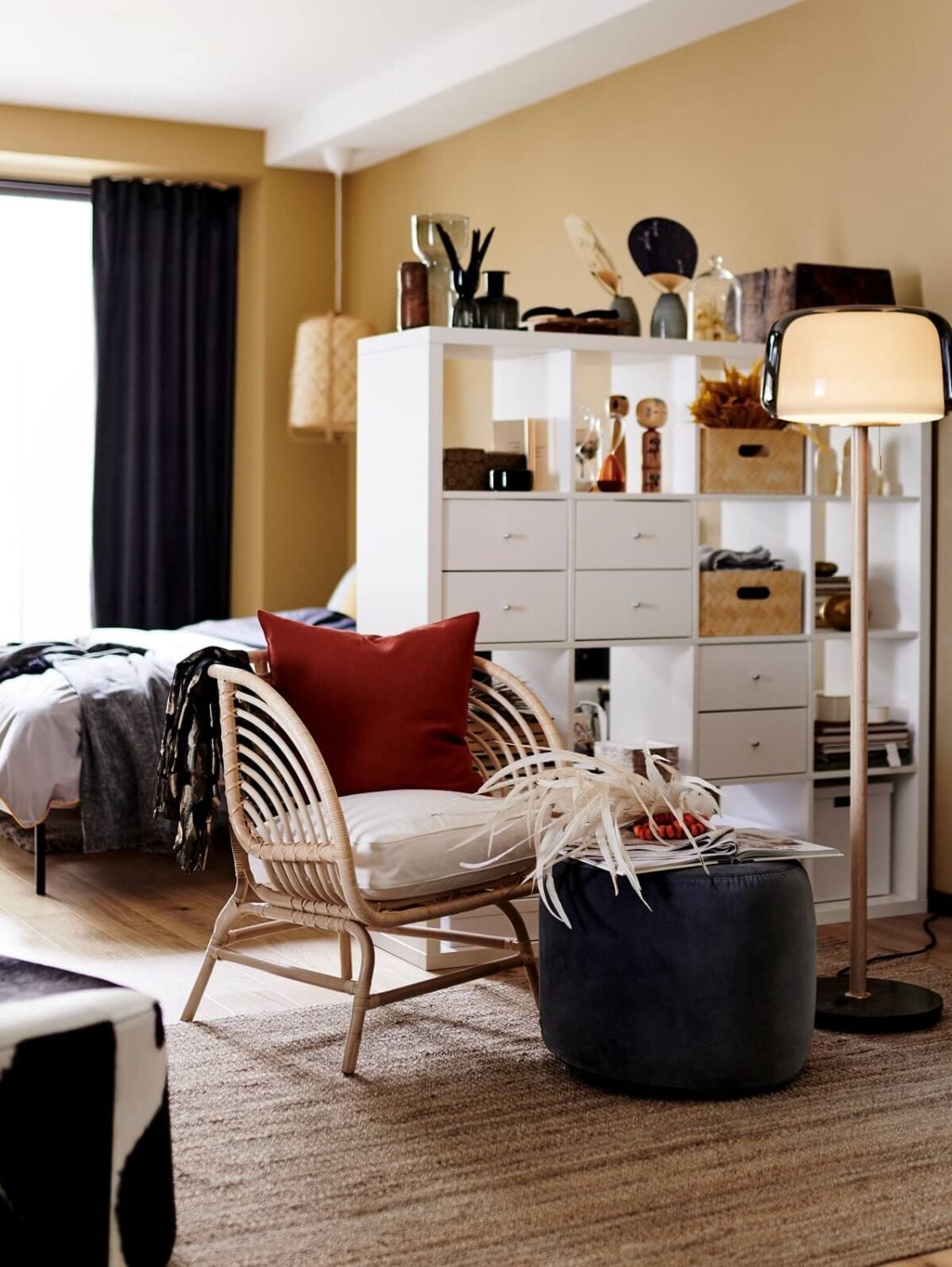 43 Ideas To Divide a Studio Apartment Into Multiple Rooms 9 yellow-studio-apartment-ikea-kallax-room-divider-nordroom