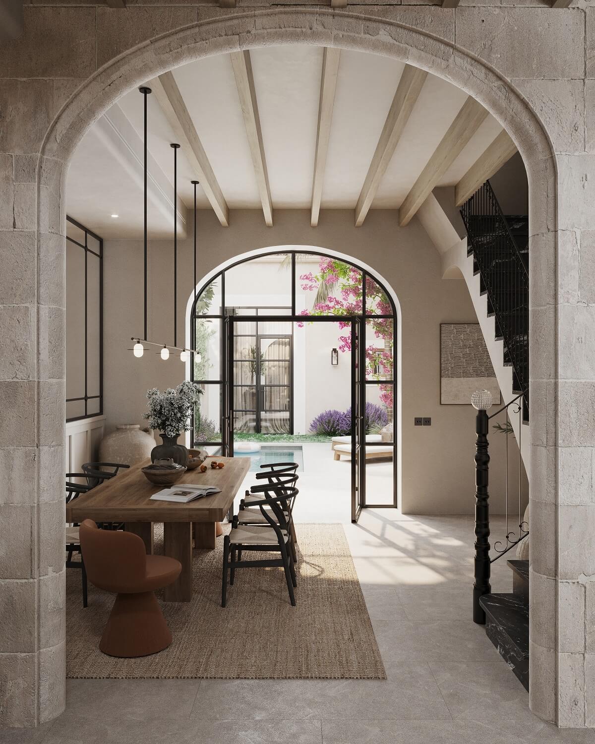 A Renovated Townhouse on Mallorca with a Swimming Pool 2 arched-doorway-dining-room-nordroom