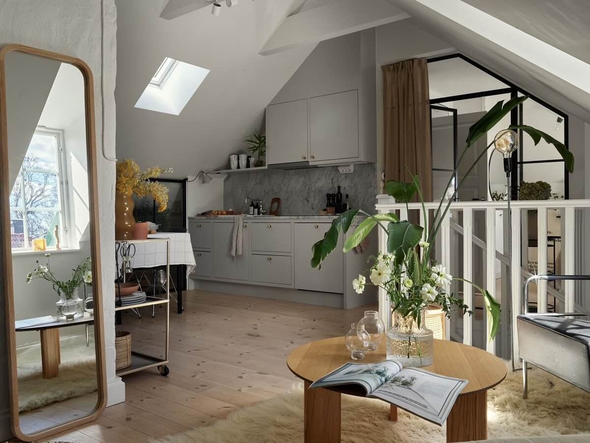 A Small Attic Apartment with Industrial Glass walls 1 attic-apartment-gray-kitchen-nordroom