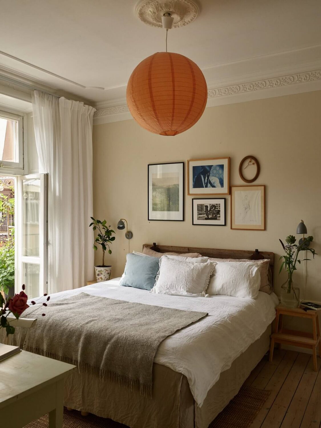 Beige Walls in a Serene Family Apartment in Sweden 14 bedroom-beige-walls-balcony-nordroom