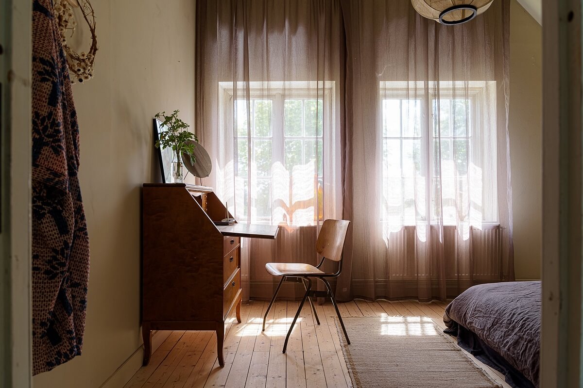 Natural Colors in a Swedish School Conversion 24 bedroom-natural-colors-vintage-writing-desk-nordroom