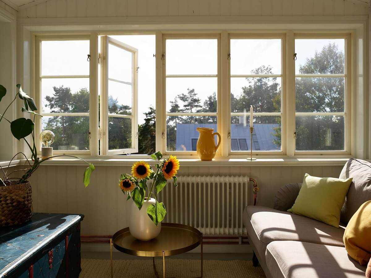 A Small Historic Swedish House with a Modern Extension 22 bedroom-reading-nook-nordroom
