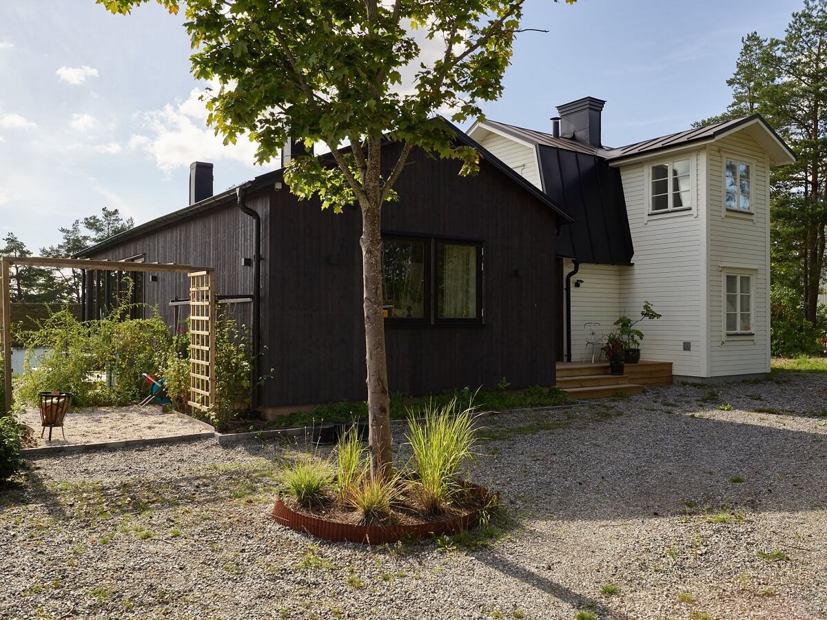 A Small Historic Swedish House with a Modern Extension 37 black-wooden-extension