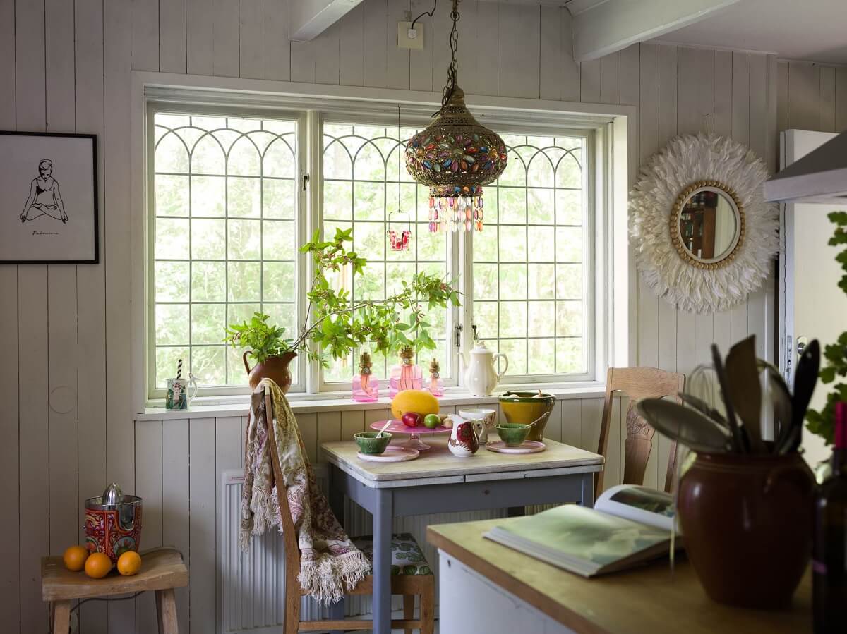 A Rustic Log Cabin With A Green Bathroom 2 cabin-kitchen-windows-wood-wall-nordroom