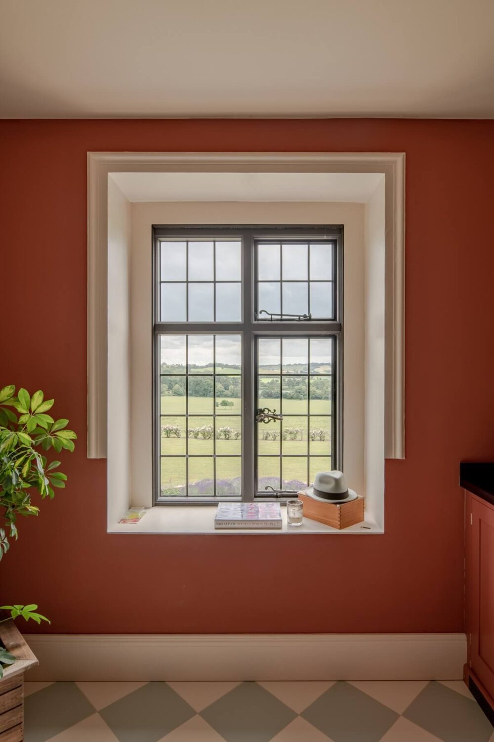 A Colorful Renovated Country House by Clarence & Graves 12 country-house-utility-room-orange-pink-walls-nordroom