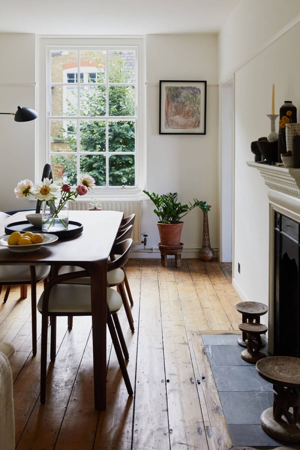 A London Apartment with a Small Blue deVOL Kitchen 1 dining-room-rustic-wooden-floor-fireplace-nordroom