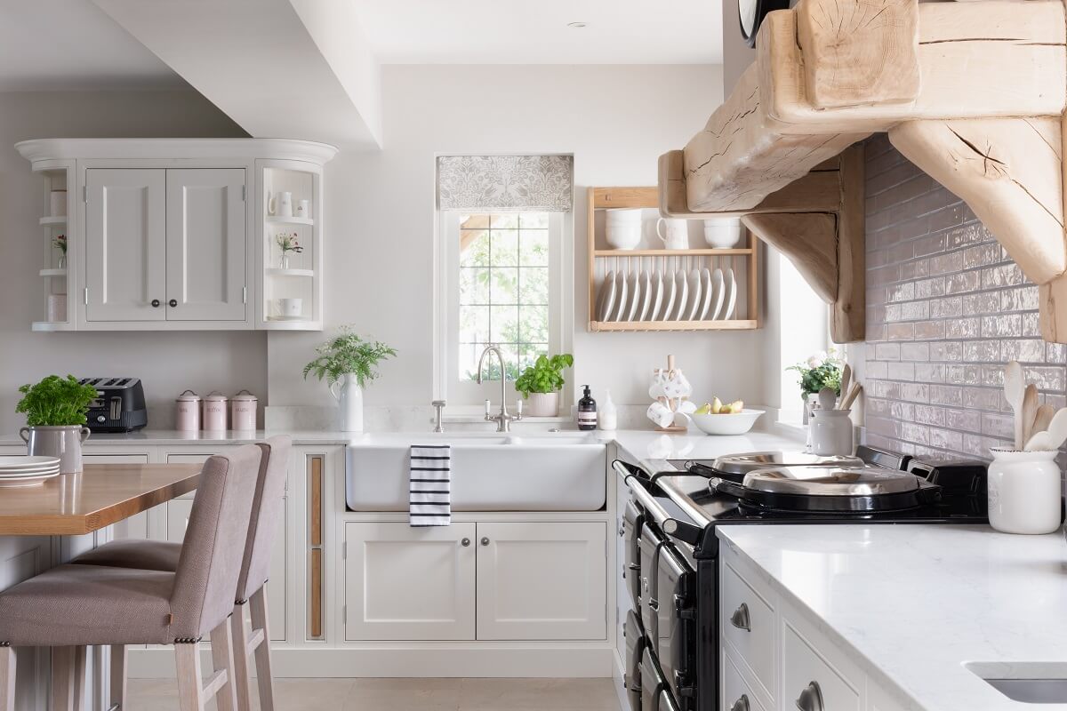 A Light and Social Country Kitchen by The Myers Touch 4 double-butler-sink-aga-stove-country-kitchen-nordroom