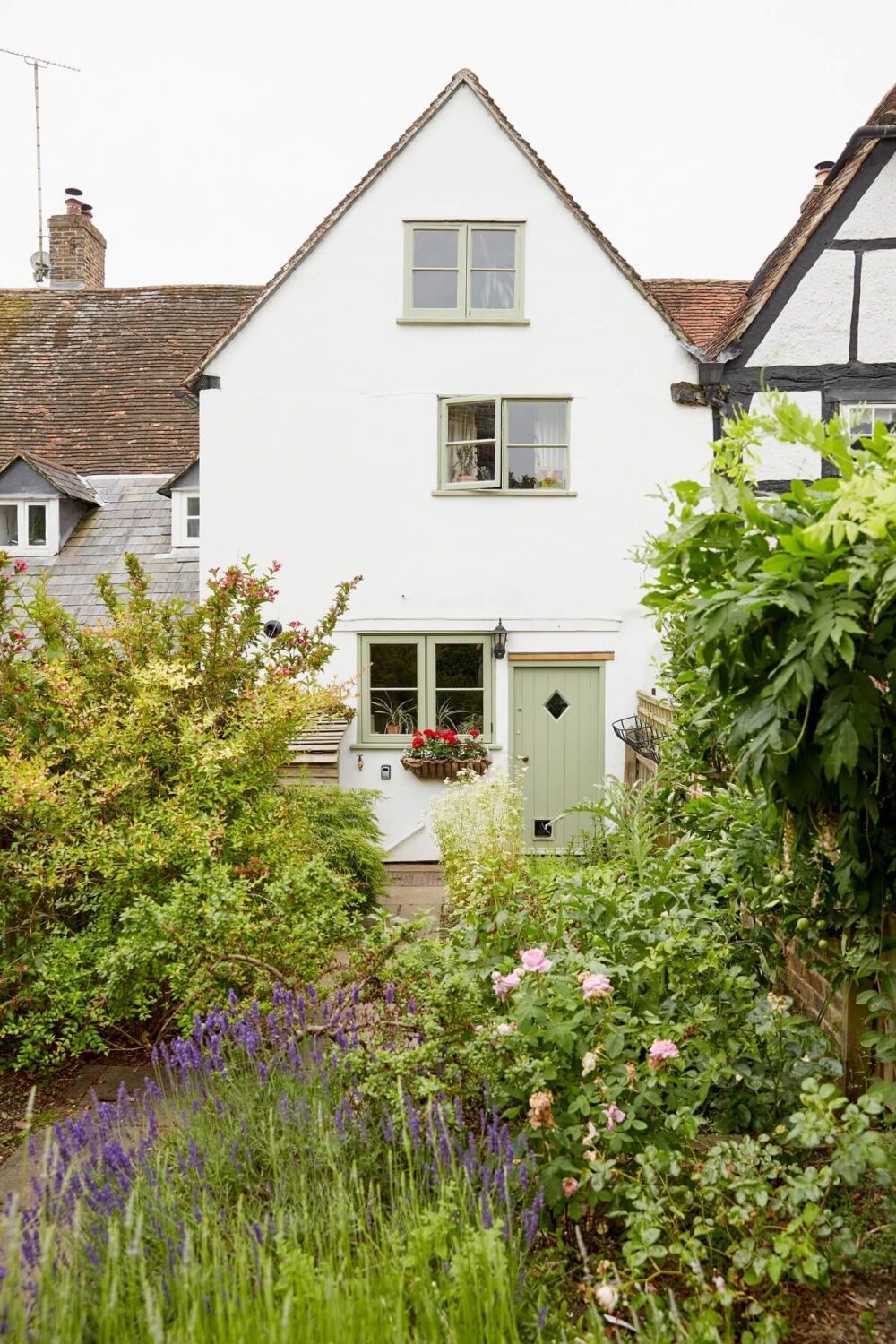 Best of 2023: Outdoor Spaces 15 english-cottage-garden-white-facade-nordroom