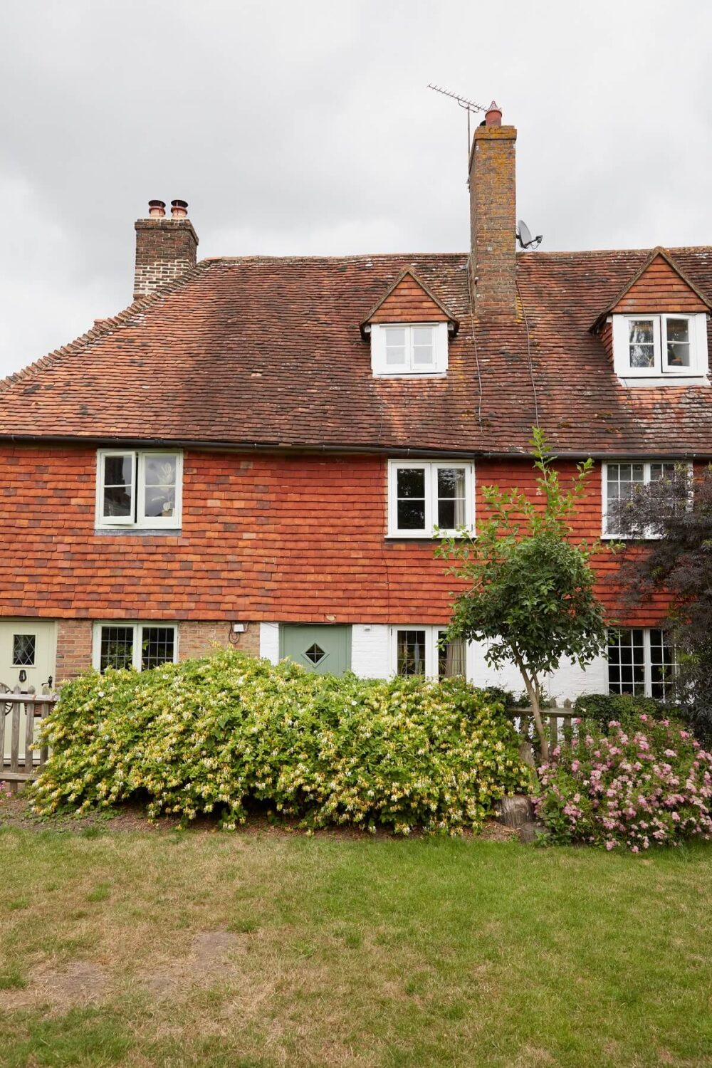 An English Cottage with a Coral Pink Kitchen 18 exterior-english-cottage-nordroom
