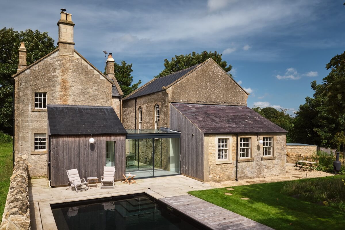 A Beautiful Chapel Conversion in England 24 exterior-modern-glass-hall-between-two-buildings-nordroom