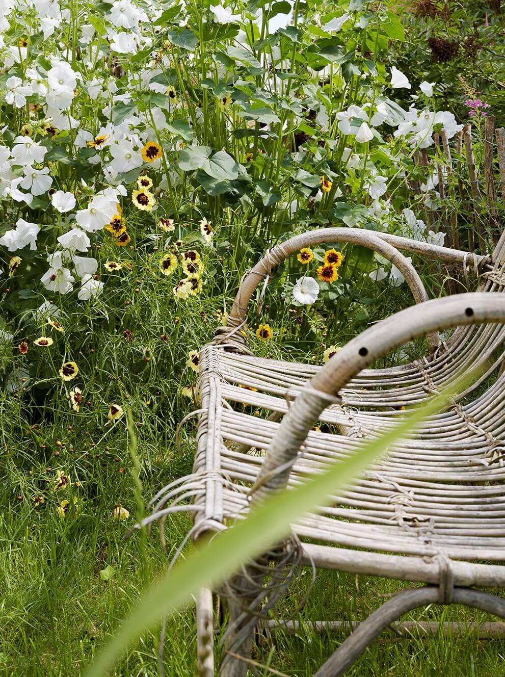 Natural Colors in a Swedish School Conversion 37 garden-seating-flowers-nordroom