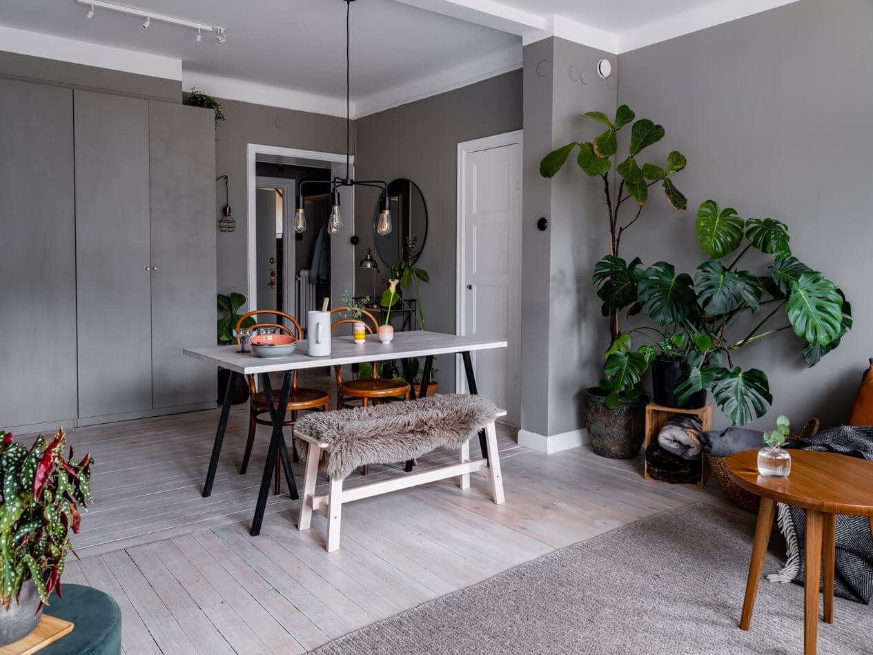 A Gray Nordic Apartment with a Terracotta Bedroom 10 gray-living-room-built-in-closets-nordroom