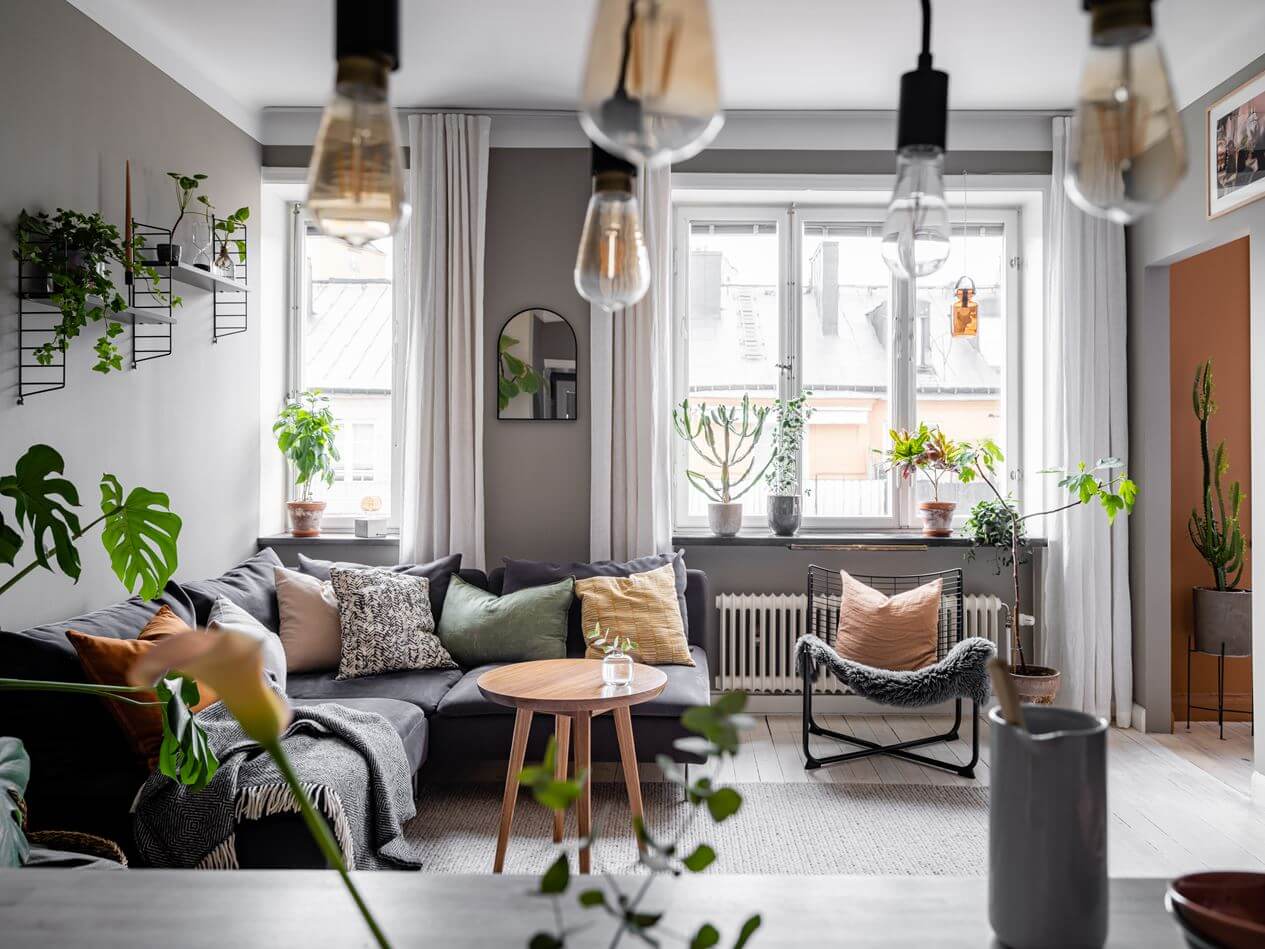 A Gray Nordic Apartment with a Terracotta Bedroom 9 gray-living-room-plants-nordroom