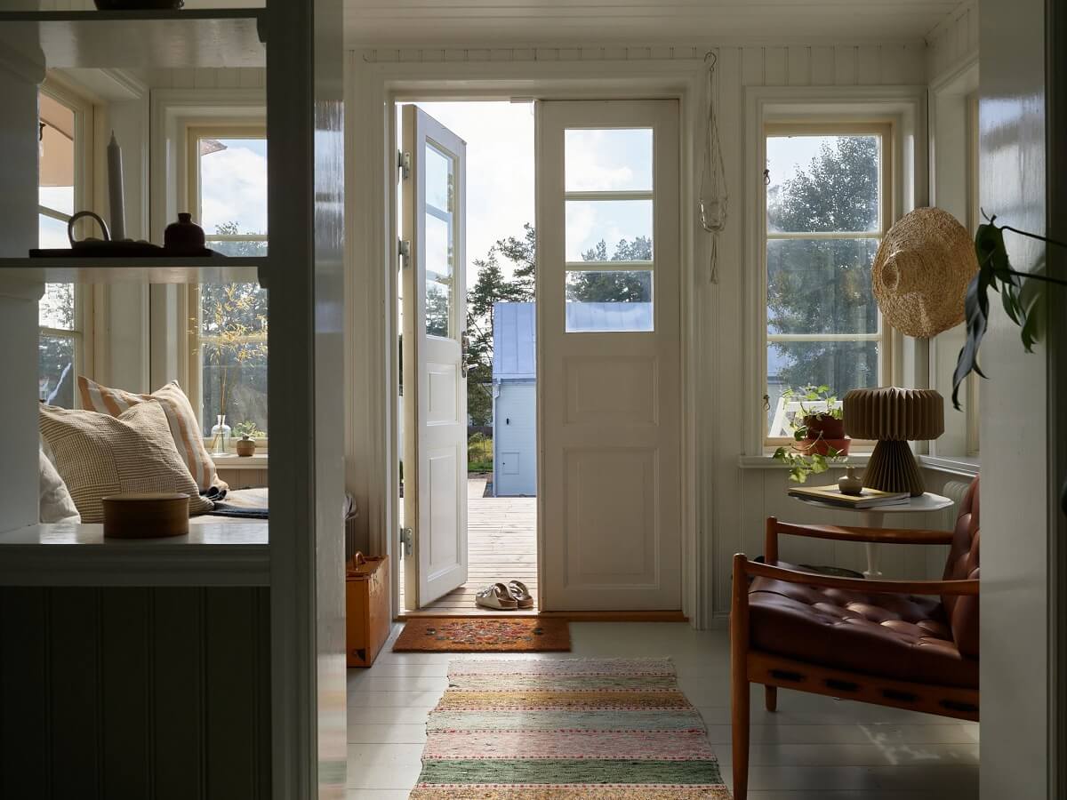 A Small Historic Swedish House with a Modern Extension 15 hallway-turned-sitting-room-nordroom