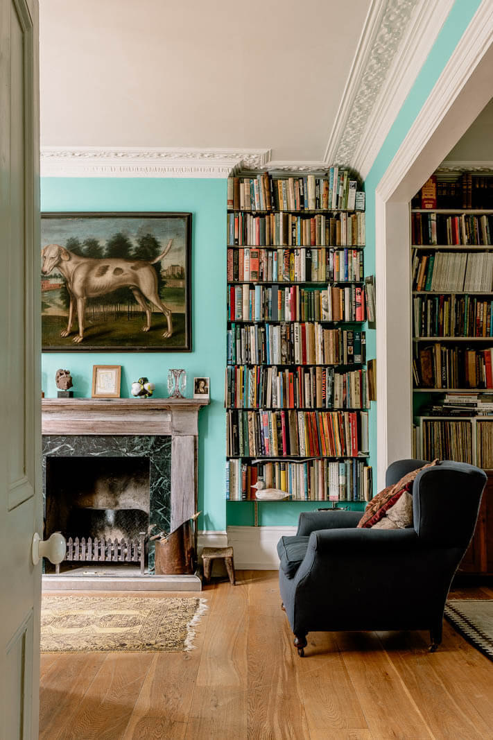 Valspar Color of the Year 2024: Renew Blue 22 historic-living-room-fresh-blue-walls-books-nordroom