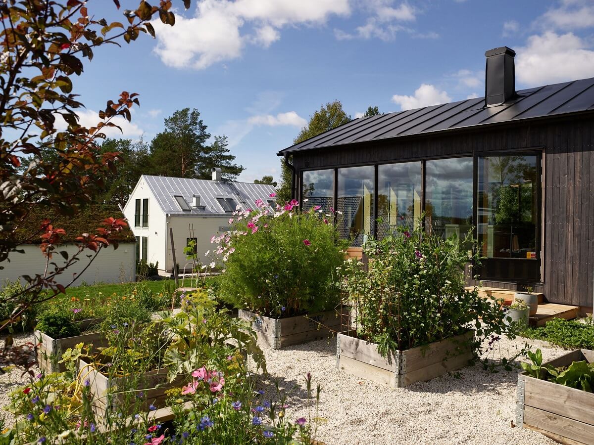 A Small Historic Swedish House with a Modern Extension 36 kitchen-garden-modern-extension