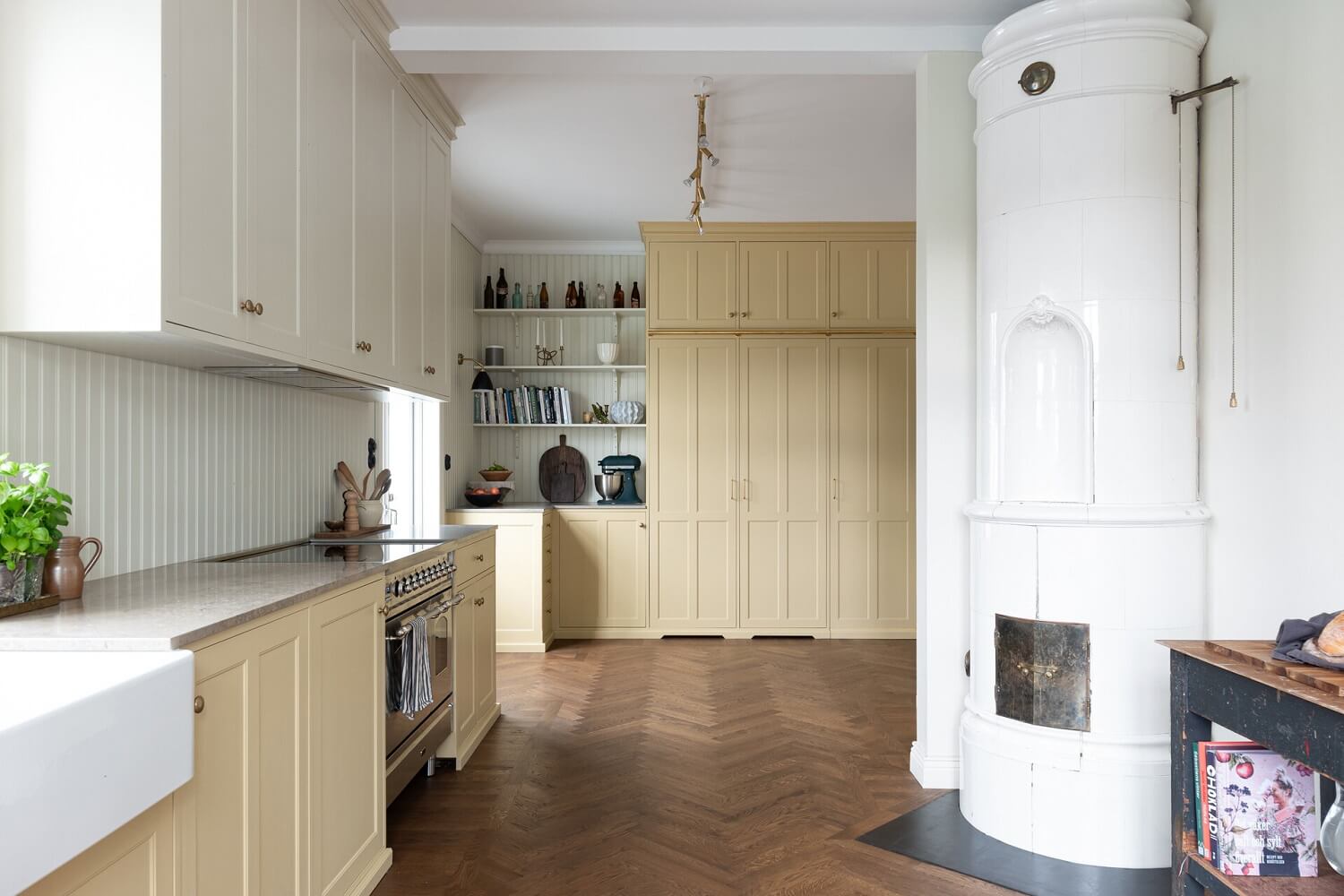 Glidden & PPG Color of the Year 2024: Limitless 29 kitchen-light-yellow-cabinets-fireplace-nordroom