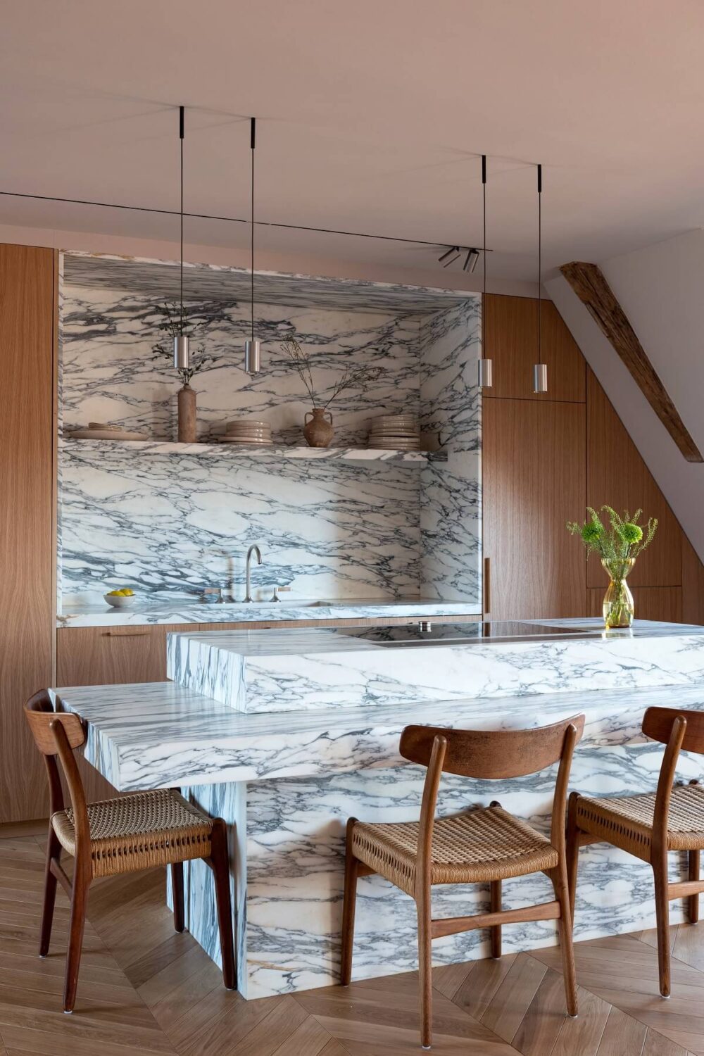 A Luxurious Penthouse Apartment in Stockholm 12 kitchen-marble-island-bar-stools-nordroom