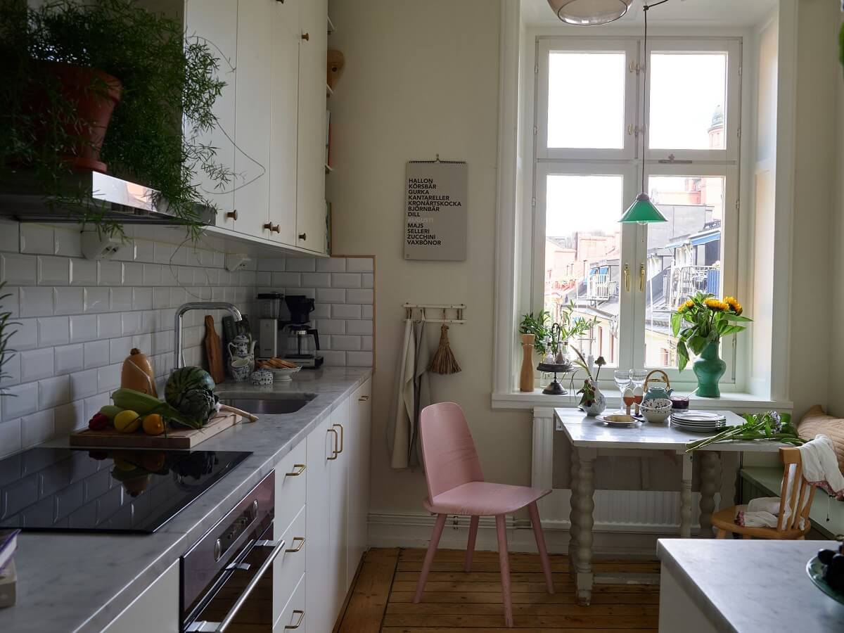 Beige Walls in a Serene Family Apartment in Sweden 6 kitchen-white-modern-cabinets-nordroom