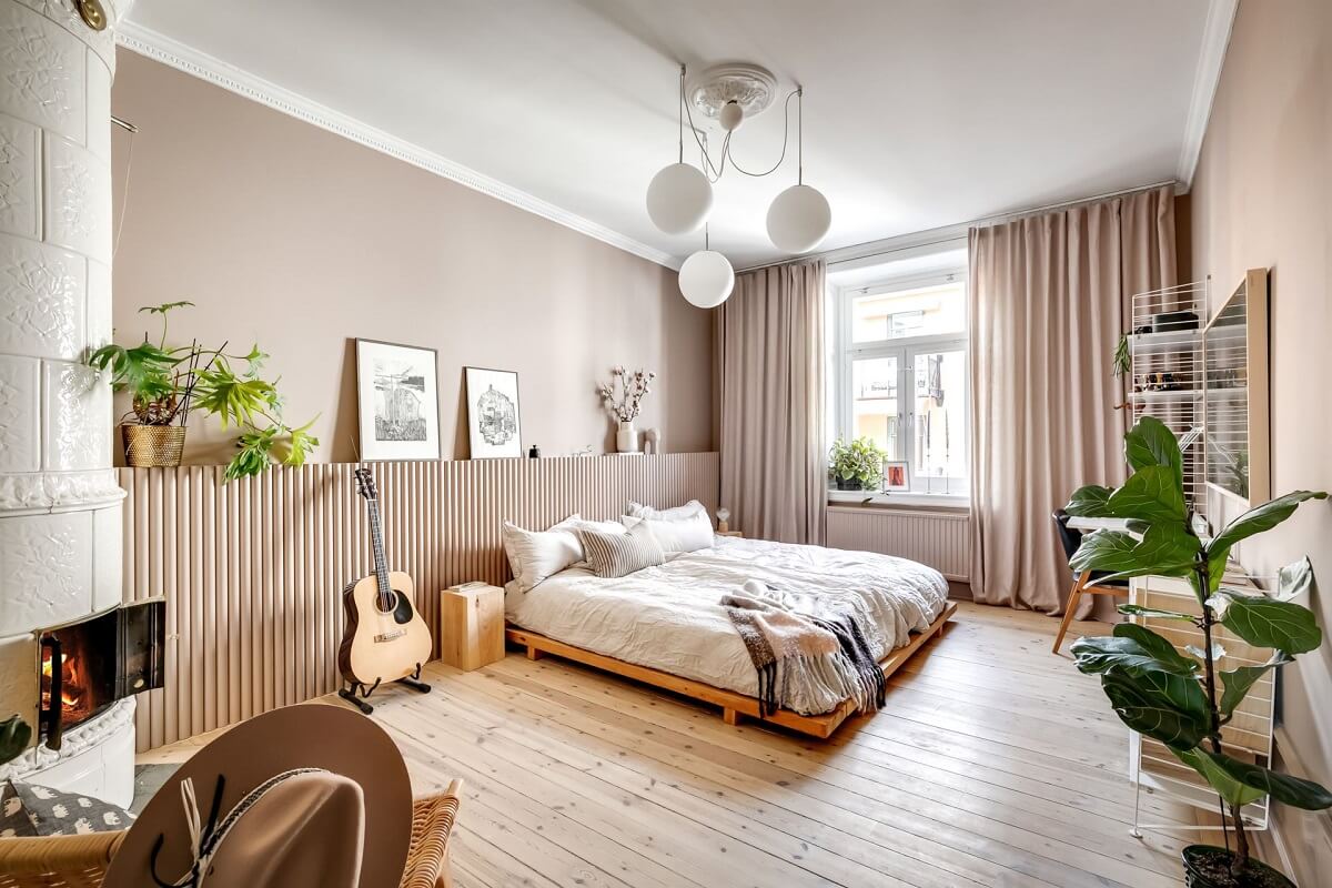 A Custom Headboard in a Light-Filled Swedish Apartment 17 large-master-bedroom-neutral-colors-custom-ribbed-bed-headboard-nordroom