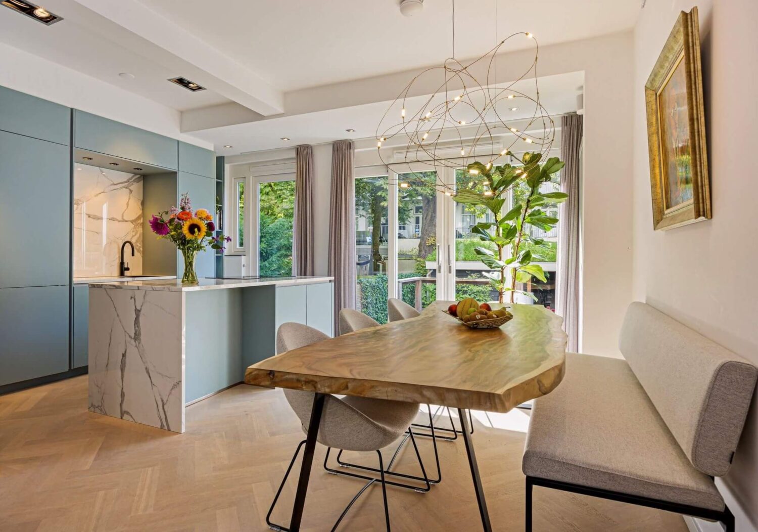 Valspar Color of the Year 2024: Renew Blue 13 ligh-blue-kitchen-cabnets-marble-island-nordroom
