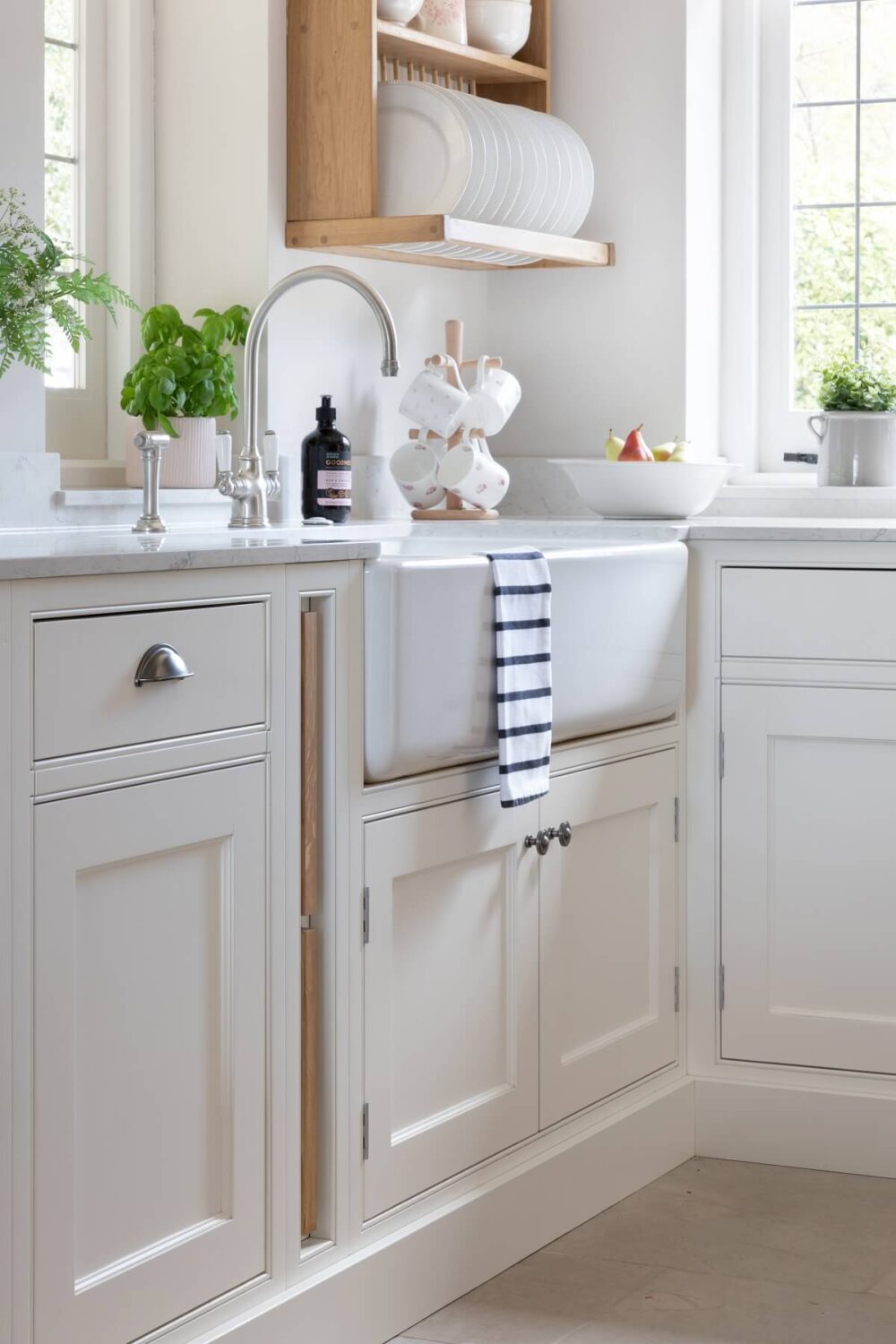 A Light and Social Country Kitchen by The Myers Touch 8 light-country-kitchen-butler-sink-windows-nordroom