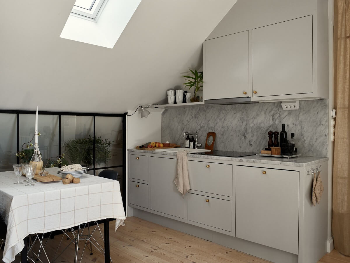 A Small Attic Apartment with Industrial Glass walls 7 light-gray-scandinavian-kitchen-nordroom