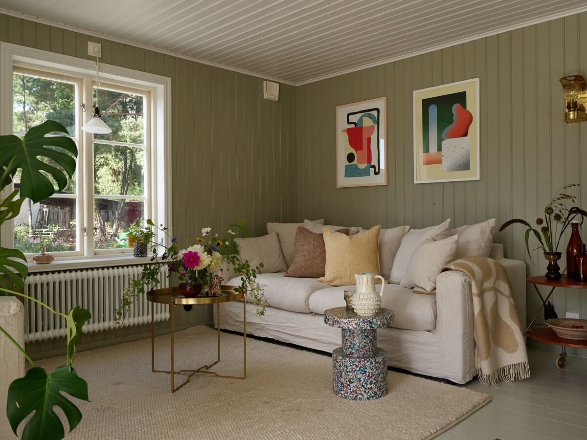 A Small Historic Swedish House with a Modern Extension 12 light-green-walls-living-room-nordroom