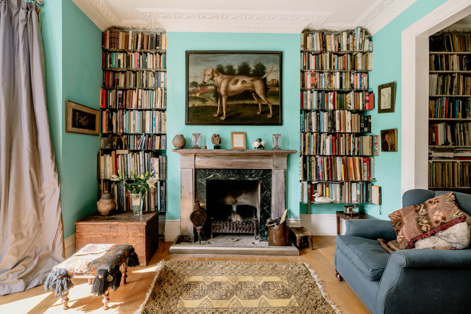 Valspar Color of the Year 2024: Renew Blue 20 living-room-fresh-blue-walls-bookshelves-nordroom