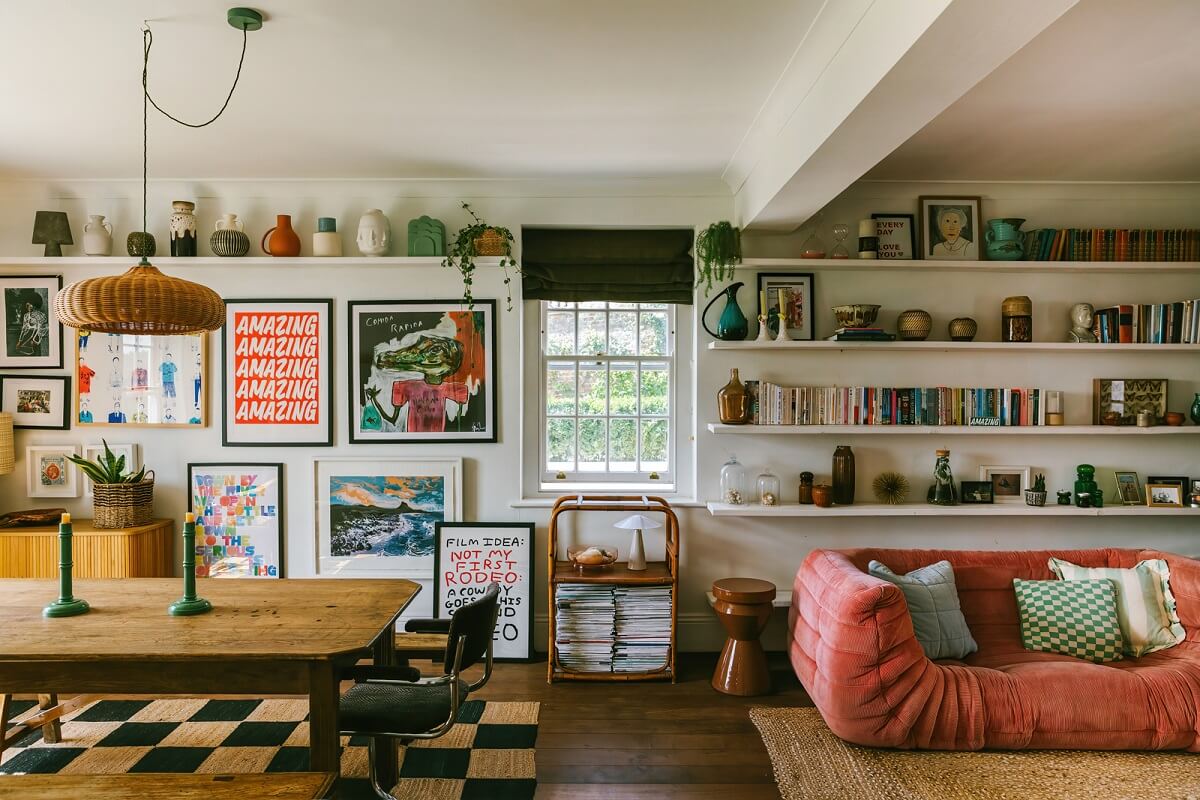A Georgian House in England with Bold Color Pops 10 living-room-pink-sofa-bookshelves-gallery-wall-nordroom