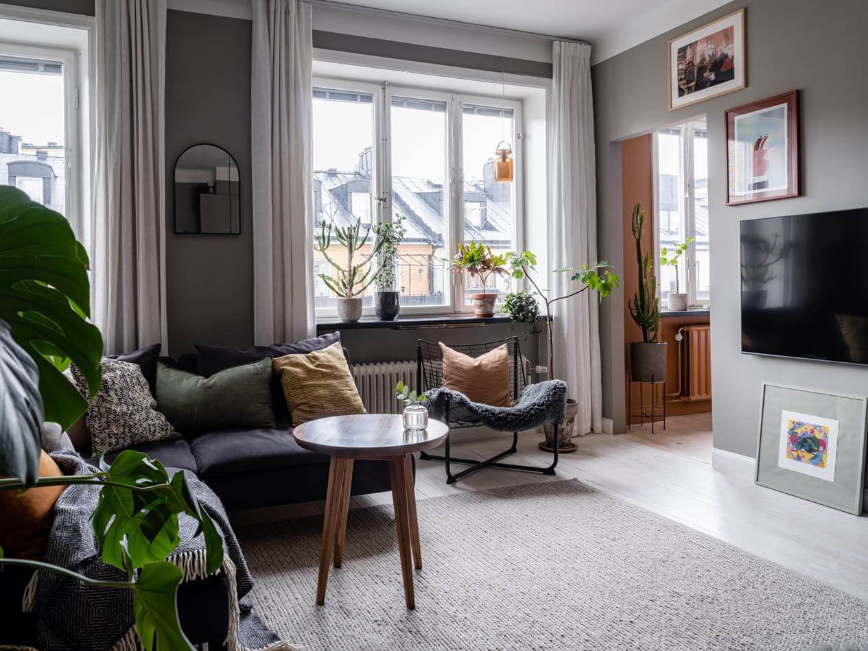 A Gray Nordic Apartment with a Terracotta Bedroom 6 living-room-with-light-gray-walls-nordroom
