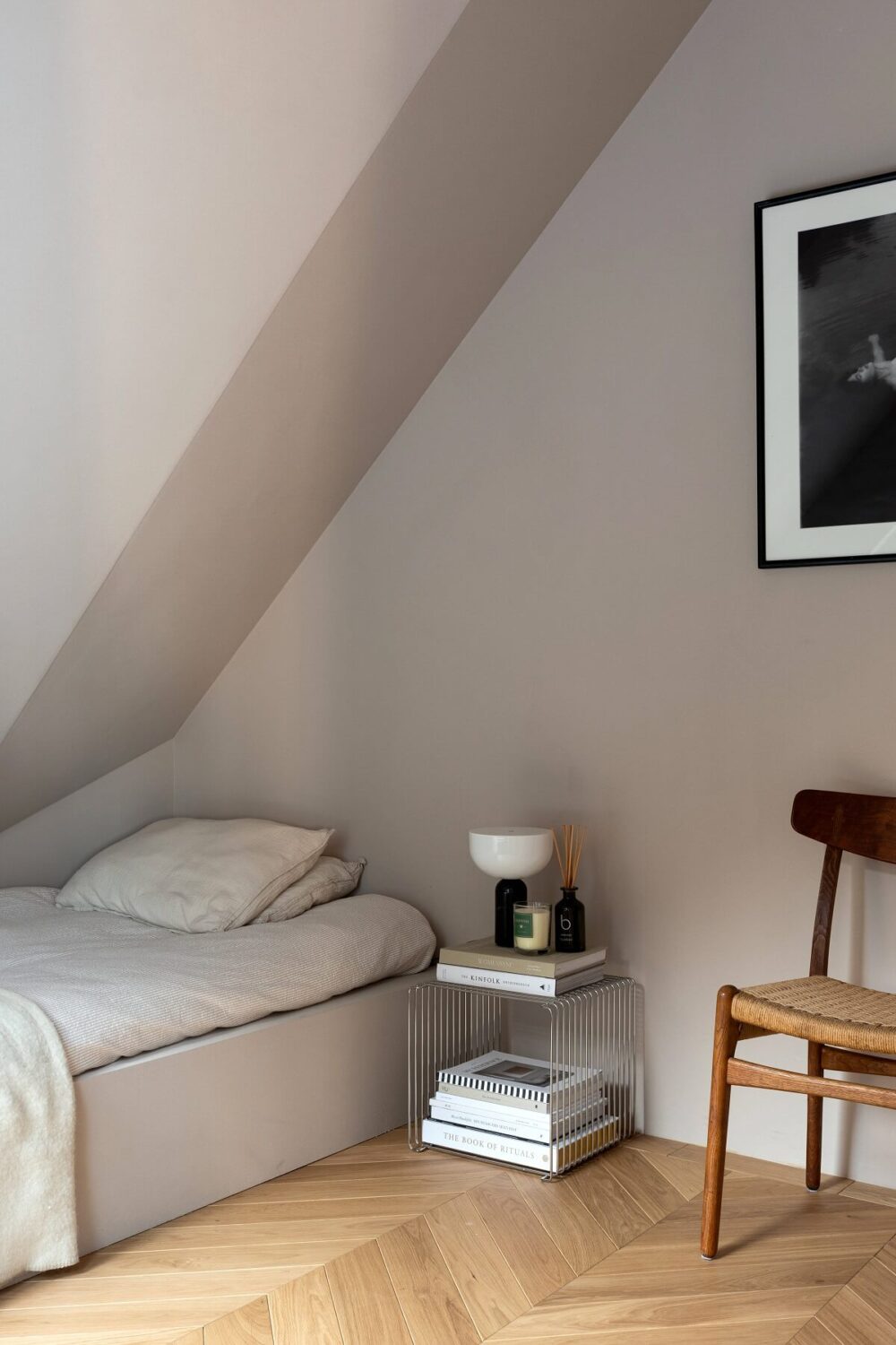 A Luxurious Penthouse Apartment in Stockholm 15 minimalistic-bedroom-slanted-ceiling-nordroom