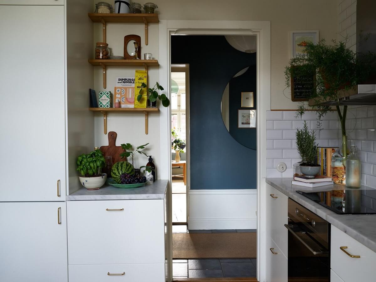 Beige Walls in a Serene Family Apartment in Sweden 12 modern-kitchen-open-shelves-nordroom