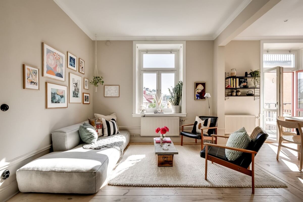 A Custom Headboard in a Light-Filled Swedish Apartment 3 natural-light-living-room-beige-walls-nordroom