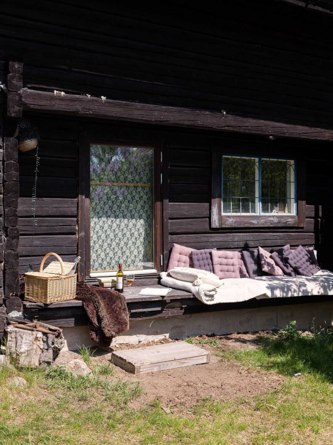 A Rustic Log Cabin With A Green Bathroom 17 outdoor-seating-log-cabin-sweden-nordroom