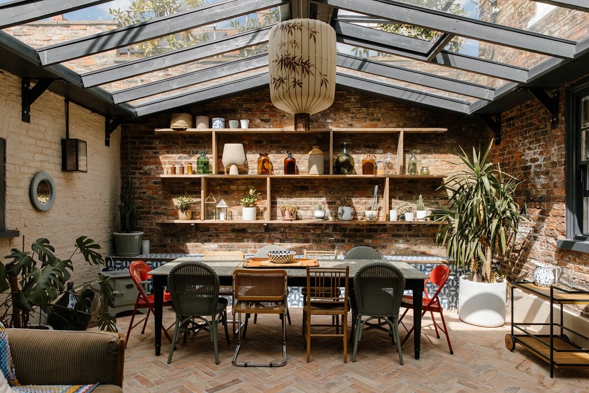A Georgian House in England with Bold Color Pops 19 patio-glass-ceiling-brick-wall-shelves-dining-table-nordroom