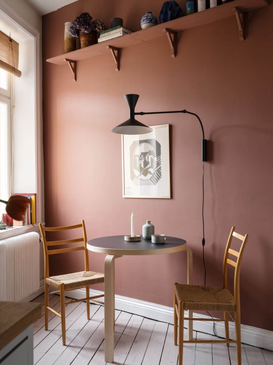 Best of 2023: Kitchens 27 pink-wall-with-shelf-small-round-dining-table-nordroom