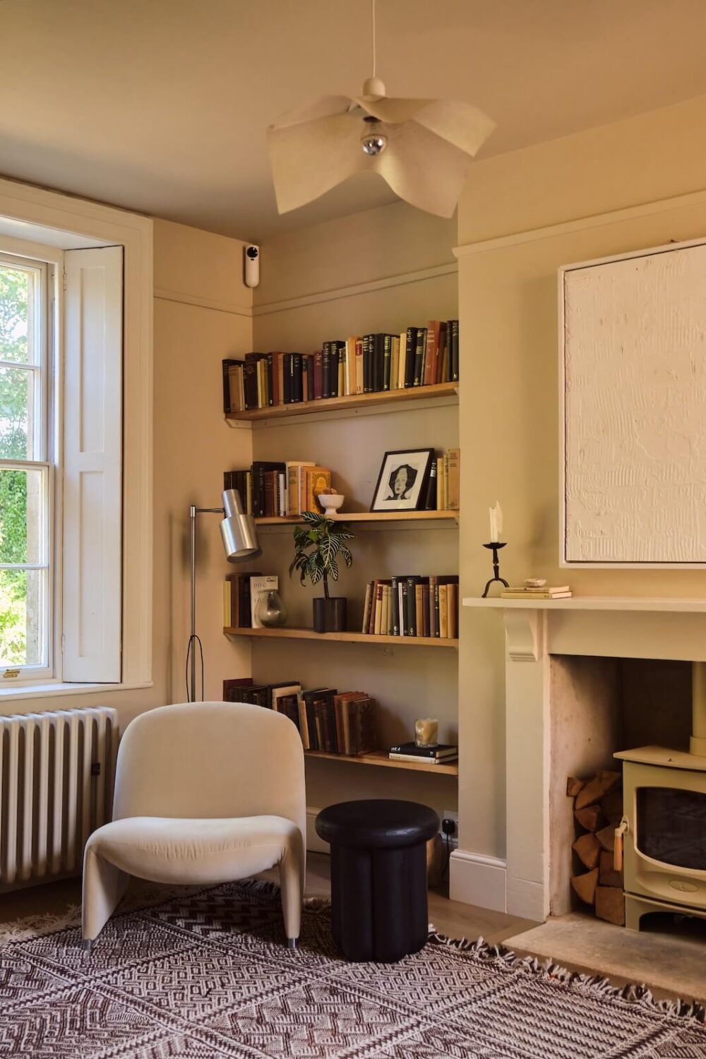 A Beautiful Chapel Conversion in England 11 reading-spot-bookshelves-woodburner-nordroom